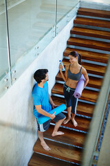 Stairs, bottle and man with woman for fitness, calm workout, and yoga class together for strong...