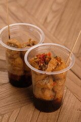 Tahu gejrot is a typical food from Cirebon, West Java, Indonesia, made from tofu that has been fried and then eaten with a sauce consisting of chili, garlic, shallots and sugar. Indonesian food