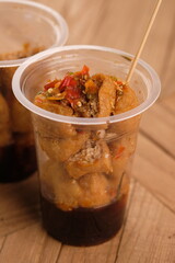 Tahu gejrot is a typical food from Cirebon, West Java, Indonesia, made from tofu that has been fried and then eaten with a sauce consisting of chili, garlic, shallots and sugar. Indonesian food