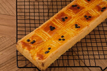 prol tape panggang is baked prole tape. cake with the main ingredients of cassava tape, flour, eggs, milk, sugar. Indonesian food. Fermented cassava cake. 