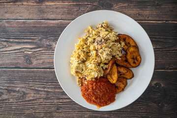 Plantain and Eggs with pepper tomato sauce ready to eat
