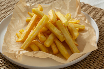 A view of a plate of french fries.
