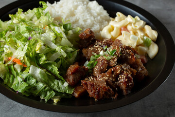 A closeup view of a beef rib finger lunch special.