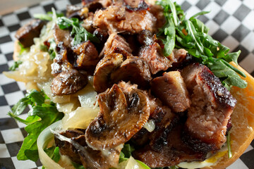 A closeup view of a brisket sandwich.