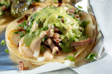 A closeup view of a beef brisket taco.