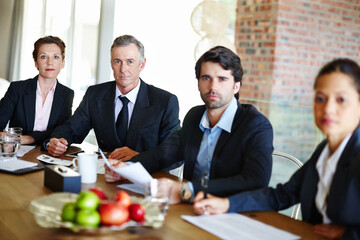 Portrait, business people or team in office for meeting, discussion and deal negotiation. Corporate, colleagues or employees in boardroom together for contract review, collaboration and feedback