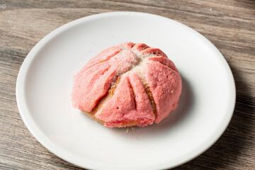 A view of a pink Mexican concha.