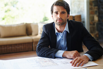 Portrait, business man and serious with blueprint for planning, building design or floor plan on...