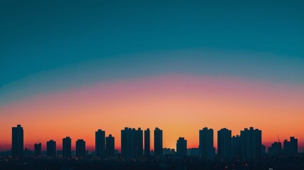 Fototapeta premium City Skyline Silhouetted Against Colorful Sunset