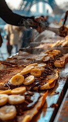 Crepes filled with Nutella and sliced bananas, served hot, Paris street vendor with Eiffel Tower in the background