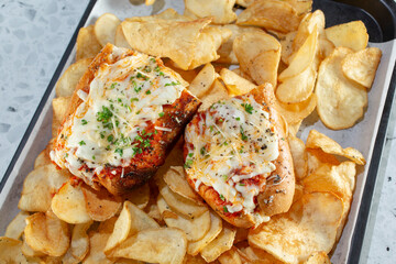 A top down view of a meatball sandwich.