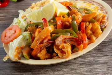 A view of a plate of camarones rancheros.