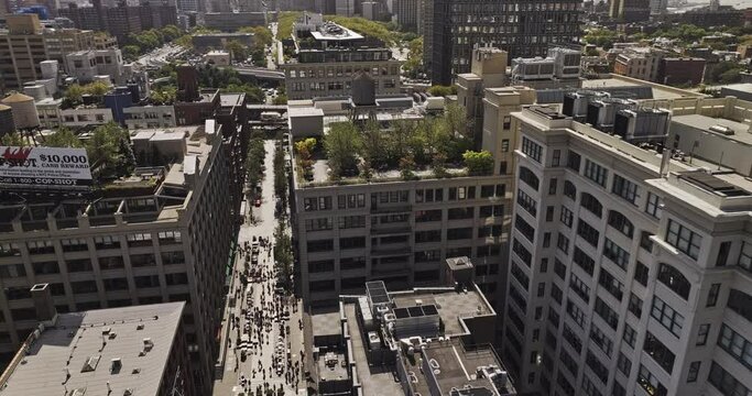 NYC New York Aerial v410 birds eye view fly around the iconic clock tower condominium in Dumbo Brooklyn, tilt up reveals Manhattan bridge over East river - Shot with Mavic 3 Pro Cine - September 2023