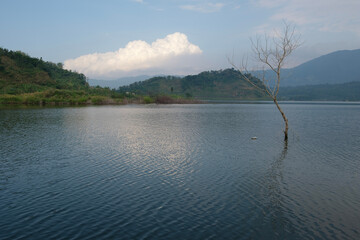 a view of the reservoir with calm water in the afternoon 