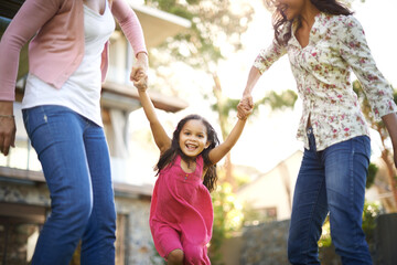 grandmother, mom or girl in garden to play with love, care or wellness outdoors for bonding in home. Holding hands, family and happy child in nature to swing with grandma, kid and smile with parent