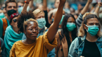 Fototapeta premium Activists hold peaceful demonstrations advocating for social change, emphasizing civic engagement and fighting for justice. 