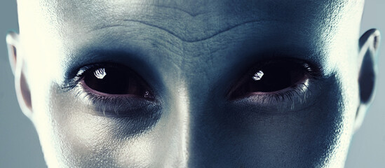 Space, creature and face of alien from galaxy, universe or secret conspiracy of sci fi character. Fantasy, cosplay and portrait of cosmic humanoid person with creepy eyes closeup in costume makeup © peopleimages.com