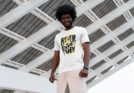 Mockup of man wearing customizable t-shirt, low angle
