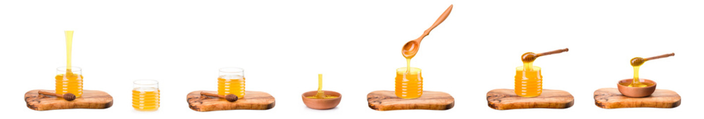 Wooden bowl full of honey and wooden dipper on wooden plank isolated on white