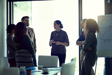 Business people, project and meeting with presentation chart, graph and conversation in an office....