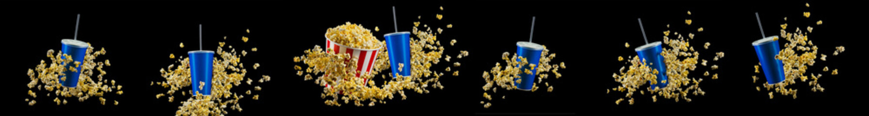 Blue cup with cap and flying popcorn isolated on black background