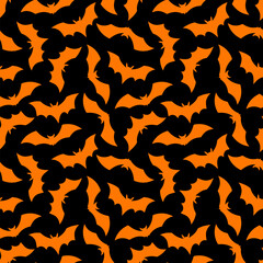 Halloween Bat seamless pattern. Vector Happy Halloween print with flying black bat silhouette on gradient orange background. For wrapping, fabric, holiday decoration, textile, wallpapers.