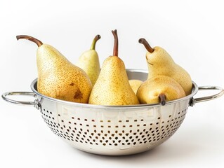 Harvesting the Season: Ripe Pears in a Colander on a White background