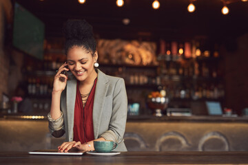 Business woman, tablet and phone call in coffee shop with smile from remote work and finance consulting freelancer. Cafe, technology and job consultation online on website and internet at restaurant