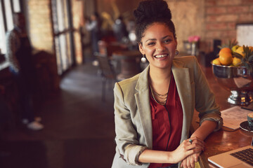 Happy woman, portrait and coffee shop with laptop for small business, management or startup. Female person, owner or entrepreneur with smile on computer for online service or connectivity at cafe