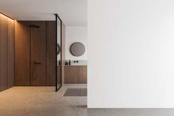Modern bathroom interior with wooden elements, light concrete floor, and white wall mockup on the right side, concept of interior design. 3D Rendering