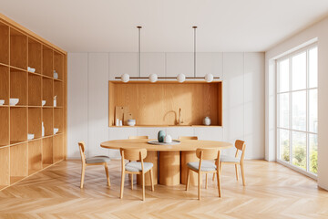 Wooden home kitchen interior with dinner table, cooking cabinet and window