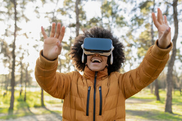 Woman Experiencing Virtual Reality Outdoors