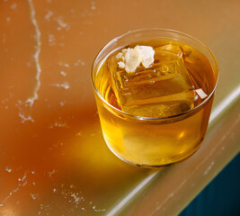 Elegant whiskey on the rocks with garnish