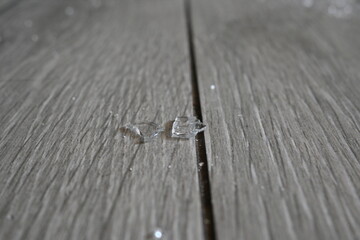 shards of broken crockery on the grey floor, broken crockery on the floor
