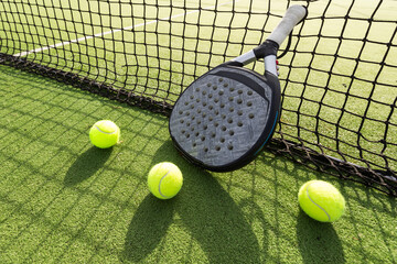 Paddle tennis racket and ball