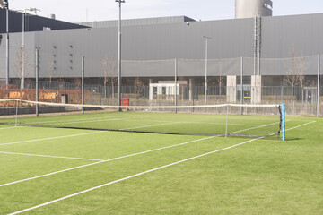 Tennis net on a green field