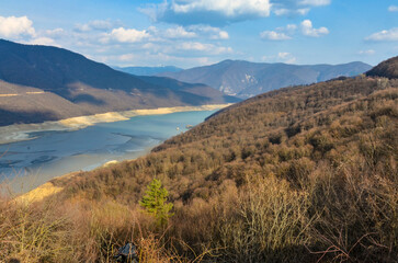 Zhinvali reservoir in spring scenic view from Georgian Military road (Dusheti municipality, Georgia)