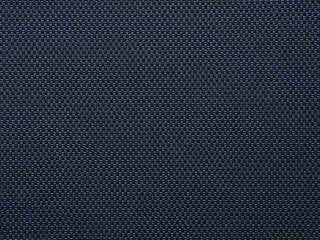 Deep midnight blue canvas with a meticulous weave, offering a texture of quiet sophistication