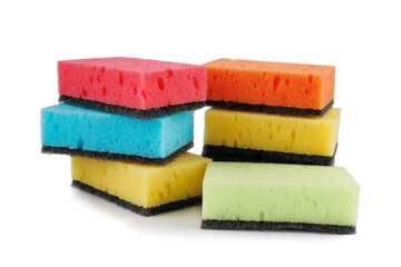 Several household sponges isolated on a white background. Stack of sponges for washing dishes.