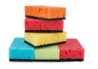 Several colored dishwashing sponges isolated on a white background.