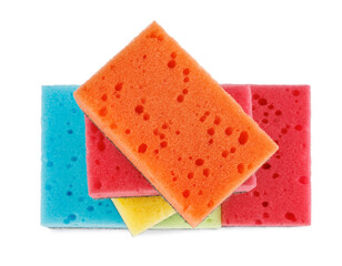 Several colored dishwashing sponges isolated on a white background.