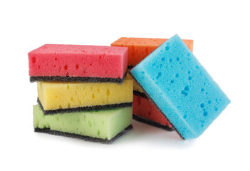 Several colored dishwashing sponges isolated on a white background.
