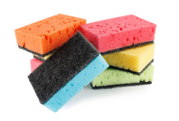 Several colored dishwashing sponges isolated on a white background.
