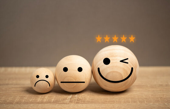 satisfaction icon on the table. the feedback for the customer give the rate star point for performance service quality. the survey marketing questionnaire. the choice of good adviser.