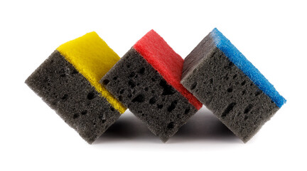Black and colored household sponges laid out in a row isolated on a white background. Sponge for washing dishes .