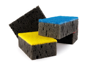 Multi-colored and black household sponges isolated on a white background. Sponge for washing dishes .
