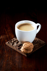Cup of coffee on rustic stone background. Close up.	