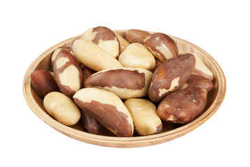 pile of brazil nut isolated cutout on white background in wood bowl