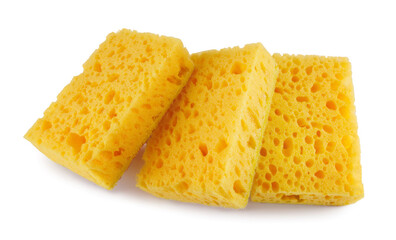 Several yellow sponges for washing dishes isolated on a white background. Household cleaning sponge.