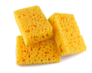 Several yellow sponges for washing dishes isolated on a white background. Household cleaning sponge.